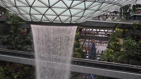 The HSBC Rain Vortex, the world's largest indoor waterfall at 40m tall Stock Footage 304264587