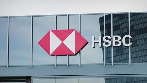 HSBC Stock data presented on the logo of the office facade editorial Stock Photos