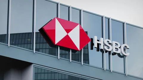 HSBC Stock data presented on the logo of the office facade editorial Stock Photos