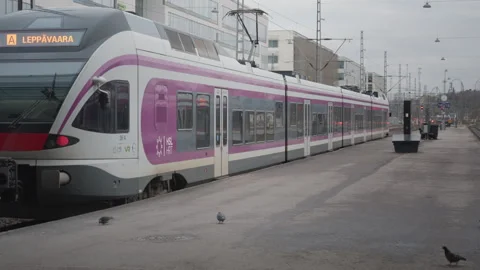 HSL commuter train at station platform with Leppavaara destination Stock Footage 326639073