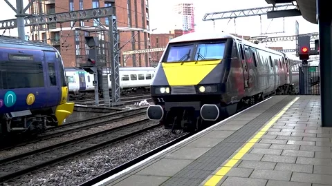 HST Intercity express passenger train in Remembrance Day colours at Leeds Stock Footage 323629438