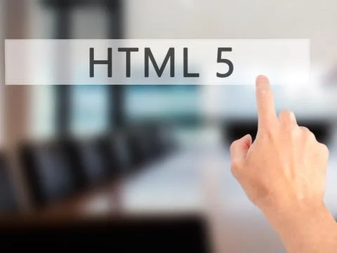 HTML 5 - Hand pressing a button on blurred background concept on visual scree Foto stock