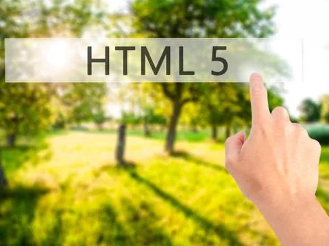 HTML 5 - Hand pressing a button on blurred background concept on visual scree Stock Photos