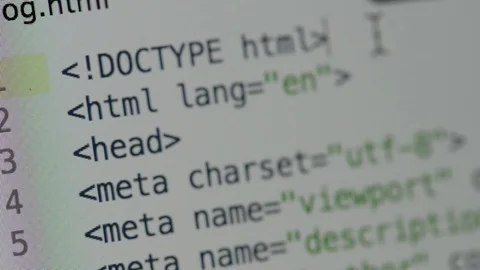 HTML and CSS code developing. Website design code programming on a laptop screen Stock Footage 77648494