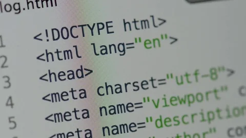 HTML and CSS code developing. Website design code programming on a laptop screen Stock Footage 77648521