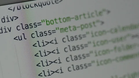 HTML and CSS code developing. Website design code programming on a laptop screen Stock Footage 77648527