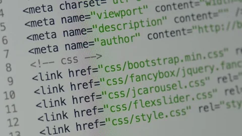 HTML and CSS code developing. Website design code programming on a laptop screen Stock Footage 77649144