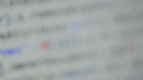 HTML and CSS code developing. Website design code programming on a laptop screen Stock Footage 77650376