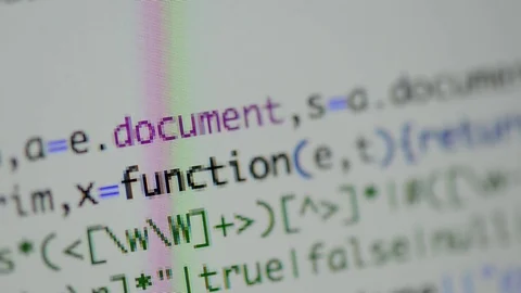 HTML and CSS code developing. Website design code programming on a laptop screen Stock Footage 77650380