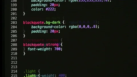 HTML and CSS code developing. Website design code programming on a laptop screen Video stock 77653018