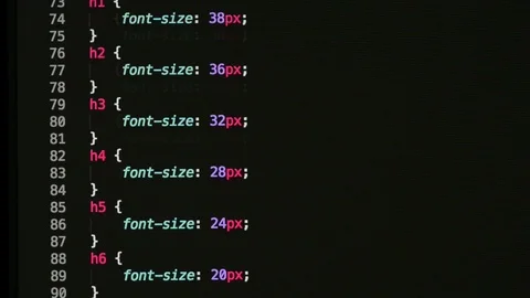HTML and CSS code developing. Website design code programming on a laptop screen Stock Footage 77654783