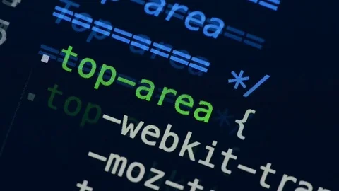 HTML and CSS code developing. Website design code programming on a laptop screen Stock Footage 77658837