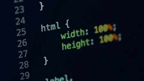 HTML and CSS code developing. Website design code programming on a laptop screen Stock Footage 77658878