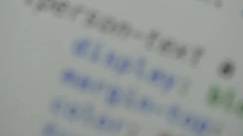 HTML and CSS code developing. Website design code programming on a laptop screen Stock Footage 77659746