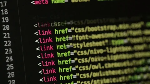 HTML and CSS code developing. Website design code programming on a laptop screen Stock Footage 77729463