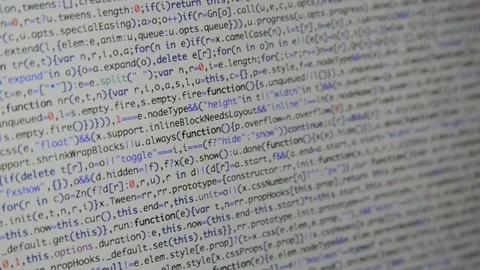 HTML and CSS code developing. Website design code programming on a laptop screen Stock Footage 77729512