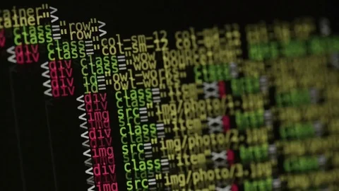 HTML and CSS code developing. Website design code programming on a laptop screen Stock Footage 77729538