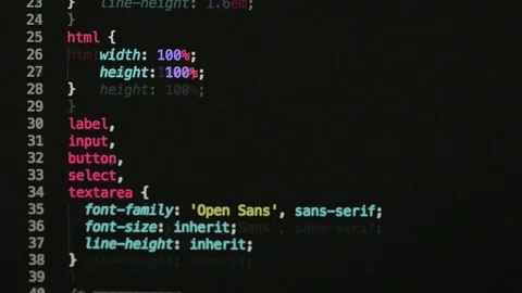 HTML and CSS code developing. Website design code programming on a laptop screen Stock Footage 77729832