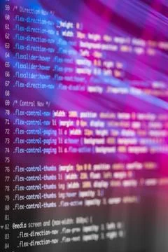HTML and CSS code developing screenshot with light effects. Stock Photos