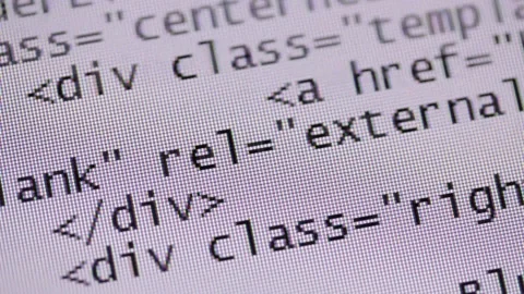 HTML code fast scrolling over white background on computer screen Stock Footage 86270046