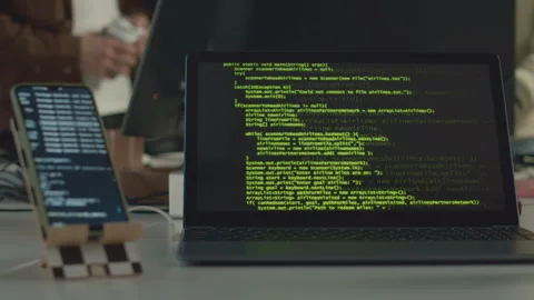 HTML Code on Smartphone and Laptop Screen Stock Footage 259155103