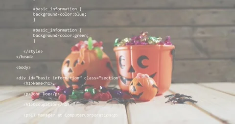 HTML markup fading and scrolling over Halloween buckets with candies showing Stock Footage 316963229
