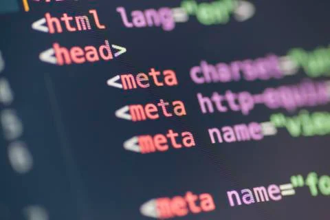 HTML meta tag code on computer screen 写真素材