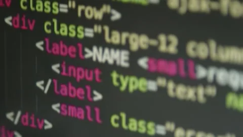 Html programming code is being displayed on a computer monitor Stock Footage 138907878