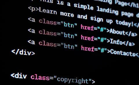 HTML website source code on the screen. Stock Photos