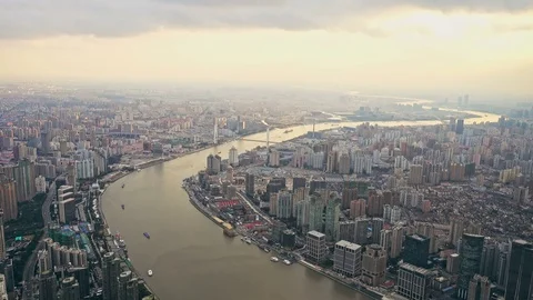 Huangpu bridge and Huangpu river in Shanghai Bund at sunset, China Video stock 76453053