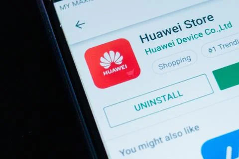 Huawei store application close up on smartphone screen. Stock Photos