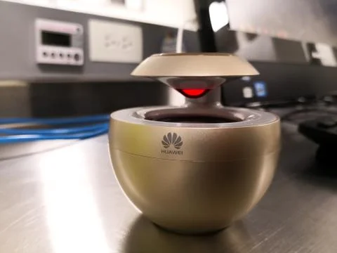 Huawei Swan Wireless Mini Bluetooth Speaker coded AM08 with gold color. Stock Photos