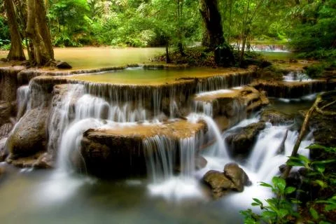 Huay mae khamin sixth level, paradise waterfall located in deep forest of tha Stock Photos