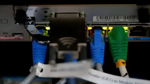 Hub Cable Network Close-up Ethernet Cables Connected to Modem Information and 스톡 동영상 334586794
