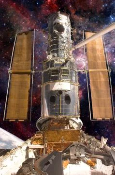 The Hubble Space Telescope. Elements of this image furnished by NASA. Stock Photos