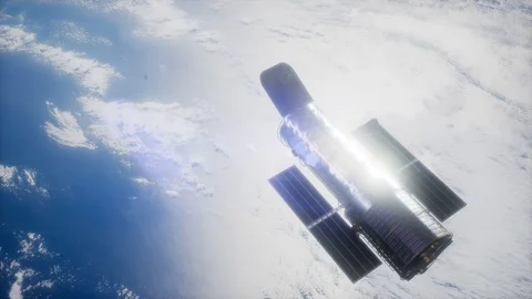 Hubble Space Telescope orbiting Earth. Elements of this image furnished by NASA. Stock Footage 95630102