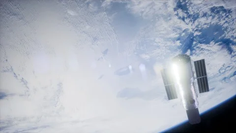 Hubble Space Telescope orbiting Earth. Elements of this image furnished by NASA. Stock Footage 104901868