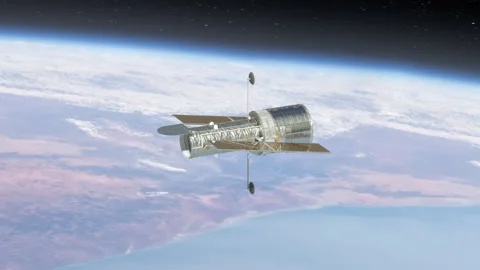 The Hubble Space Telescope orbiting the Earth. Video stock 139366323