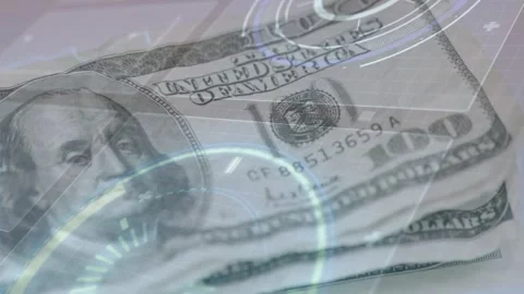 HUD activating, interface revealing stacked $100 bills, rings rotating to show Stock Footage 328657246