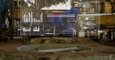 HUD appearing over pits, two workers probing and handling tray at foundry, in Stock Footage 331048527