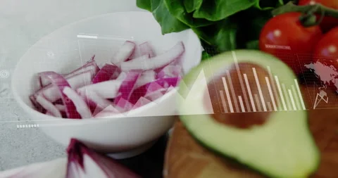 HUD elements appearing over sliced onion lettuce and avocado animating graphs Stock Footage 311098270