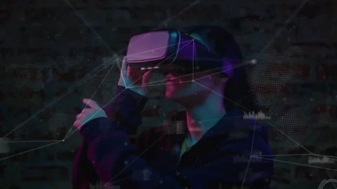 HUD lighting up causing male putting on and adjusting VR headset, testing Stock Footage 334114437