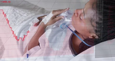 HUD overlay appearing and waveform reaching valley, patient loosening mask and Stock Footage 330272210