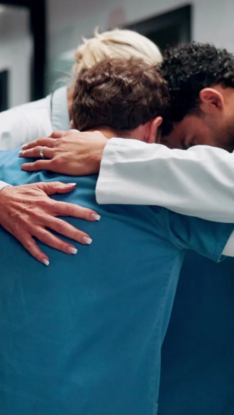 Huddle, team and doctors with nurses in hospital for solidarity, unity and Stock Footage 335925866
