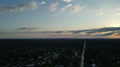 Hudson OH, Stormy-Cloudy Sunset, L2R pan Stock Footage 191687716