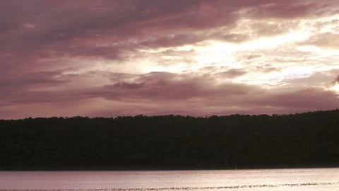 Hudson River Beautiful sunset through clouds Stock Footage