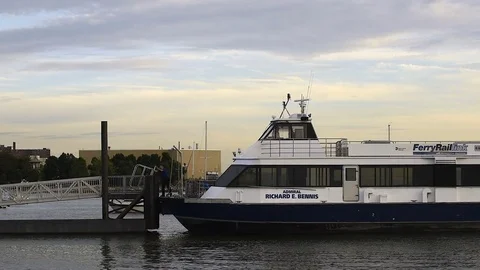 Hudson River Ferry Worker Lowers Passenger Walkway at Ossining, New York Stock Footage 73720945