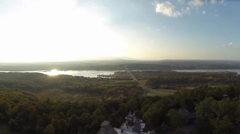 Hudson River flyover at Sunset with view of mountains [Aerial] Stock Footage 37786729