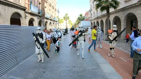 Huelva, Spain - May 5, 2019:  Parade of a group of cosplayers at a comic con Stock Footage 143289853