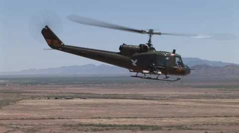 Huey gunship flying Stock Footage 45532487